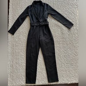 Black pretty little thing jump suit size medium